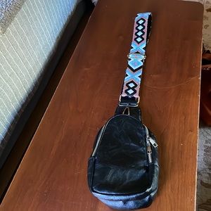 Cross body bag with strap.